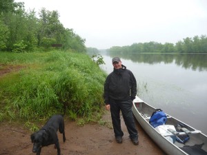 Getting ready to launch the canoes, in the rain and mosquitoes. Getting ready to launch the canoes, in the rain and mosquitoes.