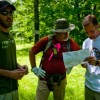 IMBA Trail Solutions pro builder Stephen Mullins working with CoGGs members at Sprirt Mountain