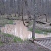 Polluted stream flowing into the St. Croix River from a frac sand mine