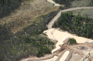 Photo of site where the containment dam burst (Wisconsin DNR photo) Photo of site where the containment dam burst (Wisconsin DNR photo)
